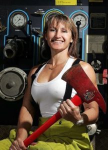 PARADISE: Karen Bradley is the only female fire fighter at Surfers Paradise Fire Station and is Miss January in the female firies 2009 calender