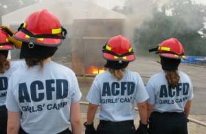 Young women attending Arlington County (VA) Fire Department Skills Camp, a summer camp to give girls and young women exposure to the fire service as a career option.